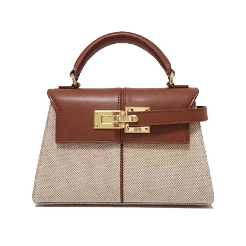 Trapezoidal bag new leather women's bag senior cross-body bag Fashion niche hand bag commuter bag
